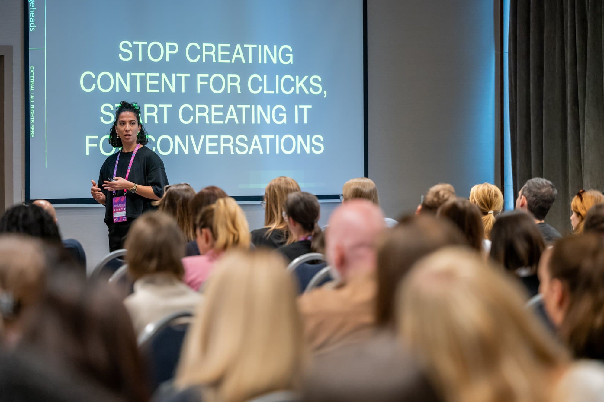 Jessica Redman speaking on stage